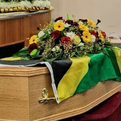 Casket Spray. - Roses , yellow Geberas, Carnations.with Greenery